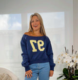 3196 Off-shoulder graphic sweater