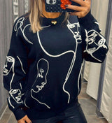 D321 Faces sweater