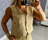 3122 Vest with pockets and pearls pin