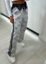 8012 Tie dye pants with lace detail at the waist